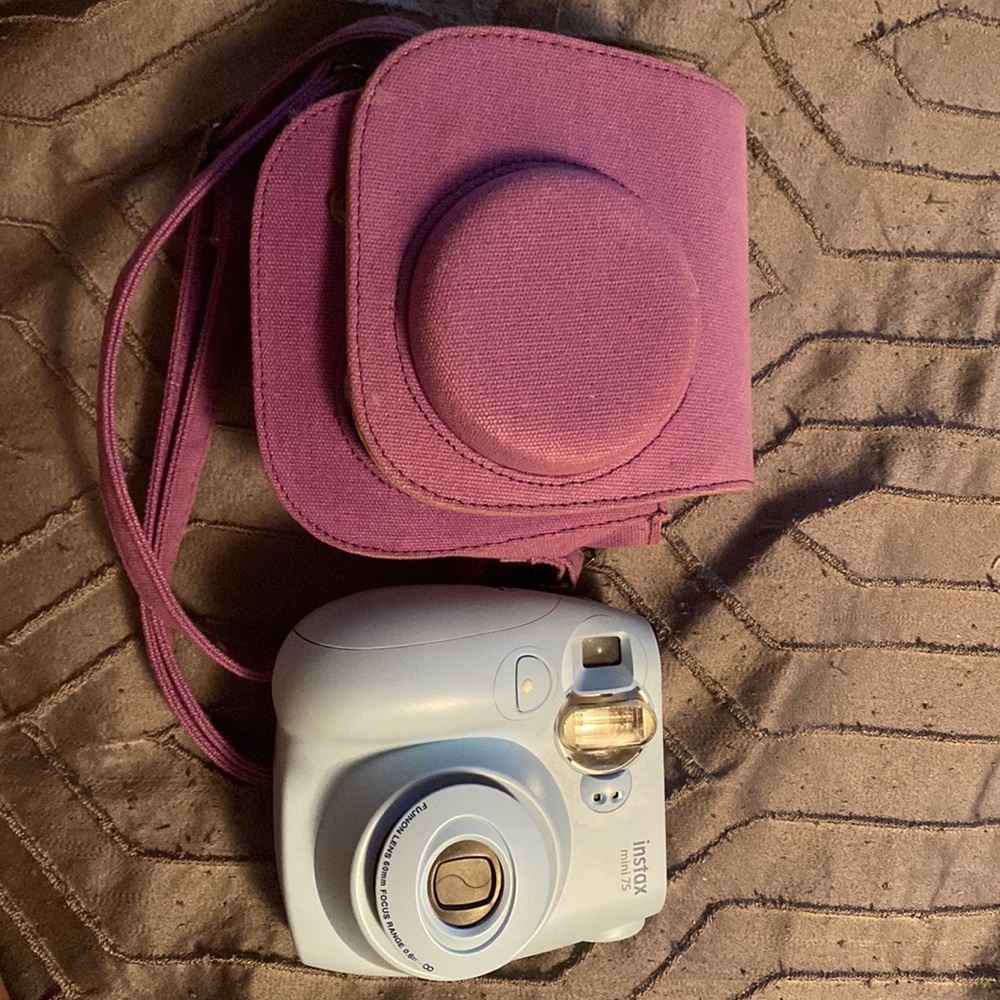 Blue instax camera with purple case